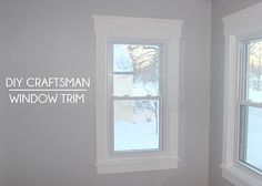 an empty room with two windows and the words diy craftsman window trim