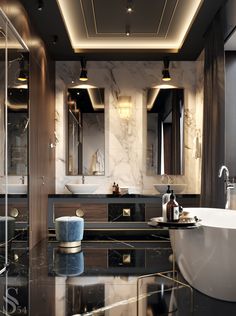 an elegant bathroom with marble counter tops and black walls, along with white bathtub