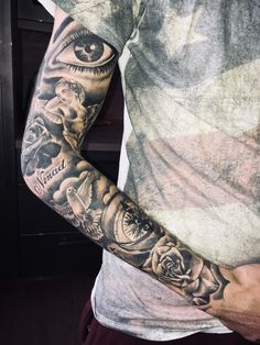 a man with a tattoo on his arm