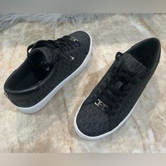 Black/Gray Leather Logo Sneakers Brand New Gray Low-top Sneakers With Studded Outsoles, Gray Low-top Sneakers With Branded Heel Counter, Michael Kors Wedge Sneakers, Mk Sneakers, Mk Shoes, City Sneakers, Michael Kors Shoes Sneakers, Michael Kors Sneakers, Michael Kors Wedges