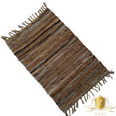 a brown rug with fringes on it