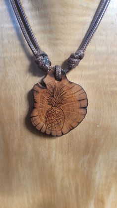 Handmade pinapple necklace, hand burnt onto Australian natural organic gum tree wood. Adjustable cord to make any length. Adjustable Natural Wood Necklace Nature-inspired, Natural Colored Necklace With Adjustable Waxed Cord, Gum Tree, Hand Burn, Wooden Necklace, Natural Organic, Pendant Necklaces, Necklace Etsy, Gum