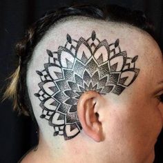 a person with a tattoo on their head