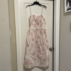 Nwt H&M Strappy Dress Cream/Light Pink, Floral Calf-Length Dress In Airy, Woven Cotton Fabric. Narrow, Adjustable, Detachable Shoulder Straps, Ruffle-Trimmed Sweetheart Neckline, And A Smocked Bodice. Gently Flared Skirt. Unlined. Midi Sleeveless Bandeau, Flared, Smocked, Strappy Dress Adjustable, Removable Straps Size: 3x Pit To Pit- 19”(Without Stretch) Length- 47” (At Current Strap Length) New With Tags Calf Length Dress, Strappy Dress, Dress Cream, Strappy Dresses, Hm Dress, Cream Dress, Flared Skirt, Woven Cotton, Flare Skirt