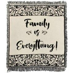 a throw with the words family is everything on it