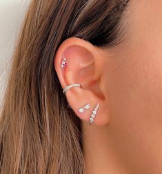 Gorgeous and fashionable non-pierced conch ear cuff earrings made of genuine 925 Sterling Silver (also available in 18K gold plated) and set with cubic zirconia stones. You don't need a piercing to wear it. Get that edgy cartilage piercing look without the pain and commitment.  It is ideal for wearing both daily and on special occasions. How to wear it? Simply place it on the smallest part of your ear and slide it down until a comfortable position. You can press it on slightly to secure it if ne Trendy White Ear Cuff, Trendy White Single Ear Cuff, Trendy Huggie Ear Cuff For Pierced Ears, Trendy Huggie Ear Cuff Single Earring, Trendy Huggie Ear Cuff As A Gift, Trendy Huggie Ear Cuff Gift, Tiny Trendy Cartilage Earrings, Dainty Huggie Ear Cuff With Matching Earrings, Trendy Silver Huggie Ear Cuff