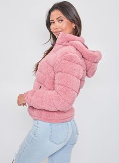 It’s all about warmth and versatility this winter! Stay cozy in our Poodle Fur Reversible Jacket! This jacket is reversible and can be worn either way, depending on the weather or your mood for the day! One side features a wind, water, and snow-resistant fabric, while the other side features a warm and cozy Sherpa material. Also designed with a removable zippered hoodie and two front pockets on each reversible side. Style this jacket with a long sleeve tee or bodysuit, jeans, and boots for a chi