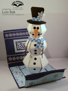 an origami snowman made out of boxes