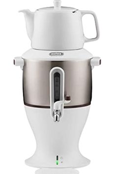 a white and silver coffee pot on top of a blender