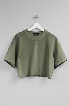 Color: BeigeFabric: Cotton 100%Care: Machine Wash Cold/ Tumble Dry Low Raw-edge dense jersey tee. 18.5' (47cm) long. Made in USA. Simple Cute Tops, Women T-shirt, Cute Aesthetic Tops, Long Crop Tops, Cute Cropped Shirts, Khaki Mini Dress, Aesthetic Tops, Trending Tops, Fitted Tshirt