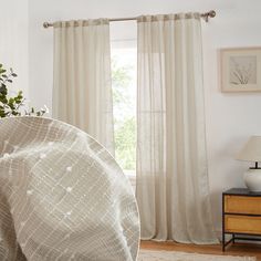 the curtains in this bedroom are white