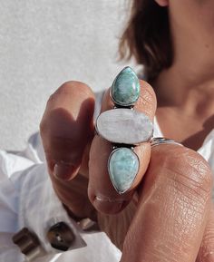 A beautifully striking size Q silver plated ring featuring a trio of large larimar and moonstone gemstones. A true statement maker, the ring is long substantial in design, perfect for adding a powerful, wow factor piece to your hand.  ▪️UK size Q, US size 8.5 ▪️Moonstone and larimar gemstones ▪️Ring length - 42mm ▪️Silver plate ▪️The ring will be presented in attractive Scraffs packaging Moonstone Gemstones, Stacked Stone, Plated Ring, Stacking Rings, Gemstone Ring, Statement Ring, Rings Statement, Moonstone, Statement Rings