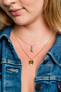 It's true, two is better than one!   A tiny cowgirl hat pendant (or cowboy) with gold curb chain paired with our Gold cowgirl boot (or cowboy boot!) on a gold cable chain.  Metal: 24kt gold-plated pendant, 18kt gold-plated chain Size: .5 L Pendant Lobster Clasp Available on 16", 18", or 20" chain (18" Fits Most) Made in the USA Snake Ring Gold, Western Necklace, Two Is Better Than One, Western Necklaces, Snake Ring Silver, Cowgirl Boot