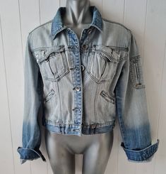 Vintage distressed denim jacket by Crafted Size UK14 Chest 19" (38" chest) Nape to hem 19" Underarm to cuff19" Model size UK10/12 Cool weathered faded, bleached, dip dyed effect Zipped small front pockets, lots of detail, rivets etc and distressing Faded Cotton Denim Jacket With Frayed Hem, Faded Denim Jacket With Frayed Hem, Faded Denim Jacket With Frayed Hem And Long Sleeves, Fitted Washed Blue Denim Jacket For Streetwear, Light Wash Distressed Cotton Denim Jacket, Acid Wash Bleached Long Sleeve Denim Jacket, 90s Style Light Wash Denim Jacket For Fall, 90s Light Wash Denim Jacket For Fall, Fitted Long Sleeve Acid Wash Denim Jacket