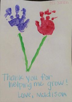 a child's handprint with two flowers and the words thank you for helping me grow