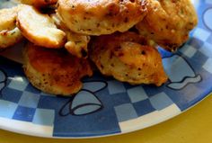 a blue and white plate topped with fried food