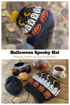 a knitted hat with pumpkins on it next to yarn balls and a cup of tea