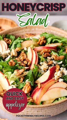 a salad with apples and walnuts in a bowl