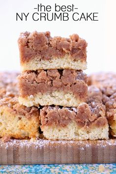 the best new york crumb cake is stacked on top of each other in front of a white background