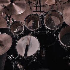 an overhead view of a drum set with cycs