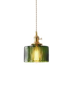 a green and gold pendant light hanging from a ceiling