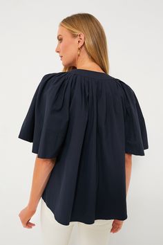 The Finley Flutter Sleeve Top is effortlessly chic. In a classic navy hue, this blouse has a flattering silhouette, oversized flutter sleeves, and a V-neckline that is perfect for year round wear. Pair with gold accessories for everything from work to brunch this season. V-neckline Oversized short flutter sleeves Boxy fit Slightly cropped Material: 100% Cotton Care: Hand wash cold, hang to dry Plus And Minus, Flutter Sleeve Top, Gold Accessories, Flutter Sleeves, Flutter Sleeve, Unique Style, Sleeve Top, Latest Trends, Hand Wash