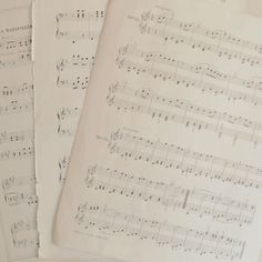 sheet music are laying on top of each other