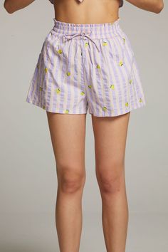 Stand out this summer in the Allover Lemons shorts in a pretty lavender stripe color. Sweet and stylish! Our Chaser Brand women's cotton shorts will keep you comfortable and chic all season long. To complete the cute outfit, pair with the matching top sold separately.Model is 5'9" and wearing size small.Fabric Content: Summer Cotton Pajama Shorts For Pajama Party, Cotton Pajama Shorts For Summer Pajama Party, Cute Spring Pajama Shorts For Loungewear, Cute Spring Loungewear Pajama Shorts, Cute Cotton Pajama Shorts With Relaxed Fit, Cotton Shorts For Pajama Party, Spring Cotton Short Sleepwear, Spring Cotton Sleepwear Shorts, Summer Vacation Sleepwear With Built-in Shorts