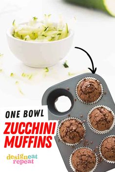 chocolate muffins with zucchini in the middle on a baking tray next to a bowl of chopped cucumbers