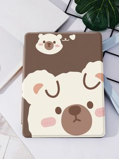 a brown and white bear is on the back of a case for an ipad air