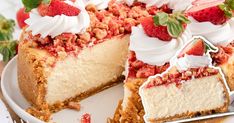 a cheesecake with strawberries and whipped cream on top is cut in half to show the layers