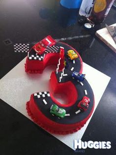 Number 3 Cake with Buttercream Icing and Fondant Track. Number 3 Cake, Bolo Blaze, Number 3 Cakes, Race Track Cake, Bolo Hot Wheels, Disney Cars Cake, Hot Wheels Cake, 3 Cake