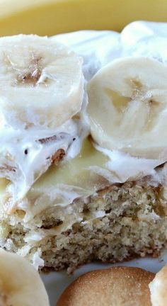 there is a piece of cake with bananas on it and frosting in the middle