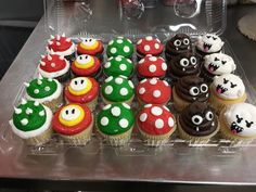 there are many cupcakes that have been decorated to look like mario and luigi