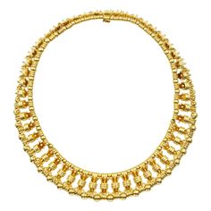 Tiffany & Co. Schlumberger "Bowtie" choker necklace in 18k yellow gold. Circa: 1980's. The necklace consists of vertically placed bowtie links, separated by smaller gold beads at the top part of the necklace and larger gold beads at the bottom. Equipped with slide box clasp. Inscribed: Tiffany&Co. Schlumberger, 750, 18k, France. Stamped with makers marks and French hallmarks. Width: 21mm. Length: 14 inches (+ 2 links extra, approx 0.25"). Weight: 208.10 grams. Jean Schlumberger, Slide Box, Vintage Tiffany, Box Clasp, Tiffany And Co, Antique Diamond, Vintage Designer, French Artists, Diamond Gemstone