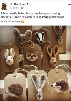 several small animal heads on brown paper bags with tags attached to them, and two smaller animals in the background