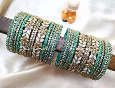 Silk Thread Earrings Designs, Bangle Making, Kalamkari Dresses, Silk Thread Bangles Design, Kuchu Designs, Silk Bangles, Silk Thread Earrings, Stone Bangles, Thread Bangles Design