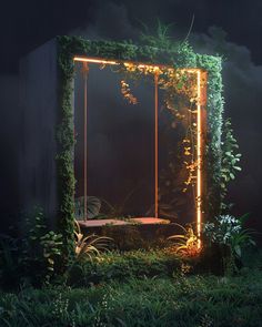 a mirror that is in the grass with lights on it and plants growing all around