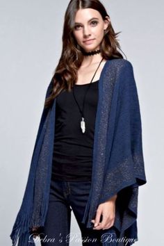 Gee Gee Lurex sparkle border fringe knit cape poncho throw ruana. Open cardigan style. Sides are not attached. Keep warm without bulk. Soft and comfy. Color: Navy, Bronze metallic Sizes: S-M-L Total Across Width 38-40-42, Length 35 includes fringe 100% Acrylic, Dry Clean only, imported E4/S13016 Winter Border, Fringe Poncho, Fringe Kimono, Poncho Cardigan, Cape Style, Knitted Cape, Fringed Poncho, Open Sleeve, Cute Blouses