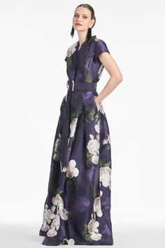 Make no mistake, the Marta Gown is no wall flower. She is the epitome of timeless, elevated personal style and quiet luxury. The fit and print are everything. The floor length silhouette is partially inspired by the impeccable tailoring a "shirt style" fit.  This incredibly flattering body finds its way into our Twilight Blooms print. A banded collar is tastefully cut away to meet concealed front buttons. Our Mikado fabric makes this dress a classic and a statement all at once. Mikado Fabric, Floral Print Gowns, Bridal Separates, Printed Gowns, Special Occasion Outfits, Floral Print Shirt, Quiet Luxury, Little White Dresses, Luxury Dress