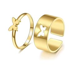 two gold rings, one with a butterfly on it