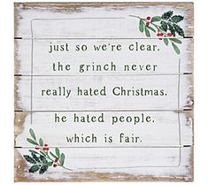 a wooden sign that says just so we're clear, the grin never really hate christmas