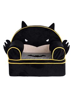 a black cat couch with yellow trimmings