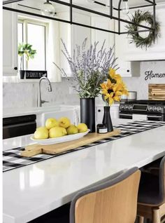 the kitchen counter is clean and ready to be used as a centerpiece for the table