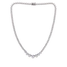 Absolute™ 18" Graduated 120-Facet Round Tennis Necklace "More facets, please." And that's just what you'll get when you treat yourself to this elegantly tapered line design, and its sparkle-loaded, 120-facet Absolute CZs.       Approx. 18"L x 3/8"W     Stamped.925; sterling silver; rhodium plating   Stone Information       All sizes and weights approximate     Clear Absolute Cubic Zirconia: 120-Facet Round; 28.55ct Tennis Necklace, Line Design, Rhodium Plated, Diamond Necklace, Cubic Zirconia, Tennis, Jewelry Necklaces, Sparkle, Plating