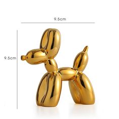 the balloon dog is shown in gold