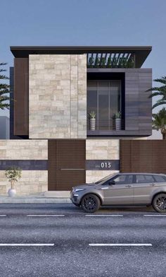 a car is parked in front of a modern house with palm trees on the side