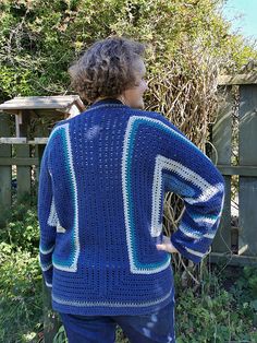 A woman wearing a hexagon crochet cardigan pattern. Hexagonal Sweater Crochet, Crochet Hexagon Cardigan Size Chart, Crochet Solid Hexagon Cardigan, 6 Day Hexagon Cardigan, Hexagon Cardigan Crochet Pattern, Crochet A Hexagon, Hexagon Crochet Cardigan