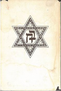 an old book with the letter f in it's center and star of david