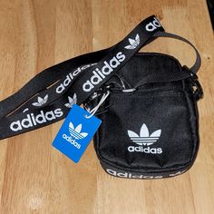 Vestal Bag For Cell Phones And Other Accessories. Adidas Crossbody Shoulder Bag For Daily Use, Trendy Adidas Shoulder Bag With Adjustable Strap, Trendy Adidas Black Bag, Trendy Black Adidas Bag, White Crossbody Shoulder Bag For Streetwear, Adidas Shoulder Bag With Adjustable Strap For Daily Use, Black Adidas Bag With Adjustable Strap, Black Adidas Shoulder Bag With Adjustable Strap, Trendy Adidas Shoulder Bag For Daily Use